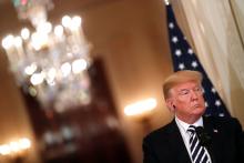 U.S. President Donald Trump listens to a question as he holds a joint news conference with Italy's Prime Minister Giuseppe Conte in the East Room of the White House in Washington, U.S., July 30, 2018. PHOTO BY REUTERS/Carlos Barria