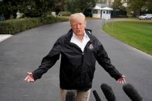 U.S. President Donald Trump talks to the media on the South Lawn of the White House in Washington, U.S., before his departure to California, November 17, 2018. PHOTO BY REUTERS/Yuri Gripas