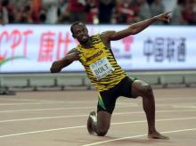 Usain Bolt (JAM) poses after winning the 200m in 19.55 during the IAAF World Championships in Athletics at National Stadium, Beijing, China, August 27, 2015. PHOTO BY USA TODAY Sports/Kirby Lee