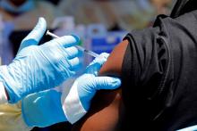 A health worker injects a man with Ebola vaccine in Goma, Democratic Republic of Congo, August 5, 2019.  PHOTO BY REUTERS/Baz Ratner