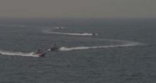Footage taken aboard the USS Nitze shows of Islamic Revolutionary Guard vessels. PHOTO BY REUTERS TV