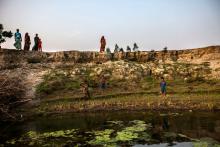 Villagers gather along an eroded river bank in the Jamalpur district of Northern Bangladesh, April 19, 2016. PHOTO BY REUTERS//Saiful Huq Omi