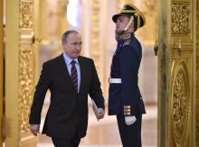 Russia's President Vladimir Putin arrives to chair a meeting at the Kremlin. PHOTO BY REUTERS/Alexander Nemenov