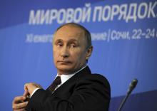 Russia's President Vladimir Putin attends a meeting at the Valdai Discussion Club in Sochi, October 24, 2014. PHOTO BY REUTERS/Mikhail Klimentyev