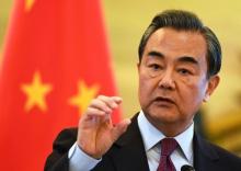 Chinese Foreign Minister Wang Yi speaks during a joint press conference with Iranian Foreign Minister Mohammad Javad Zarif in Beijing, China, December 5, 2016. PHOTO BY REUTERS/Greg Baker