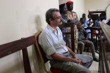 William John Endley, a South African national and an adviser to South Sudanese rebel leader Riek Machar, sits in the dock, in the High Court in Juba, South Sudan, February 23, 2018. PHOTO BY REUTERS/Jok Solomun