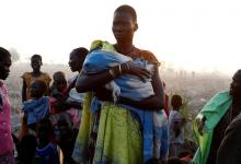 A woman waits to be registered prior to a food distribution carried out by the United Nations World Food Programme (WFP) in Thonyor, Leer state, South Sudan, February 26, 2017. PHOTO BY REUTERS/Siegfried Modola
