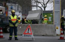 Workers place concrete barriers outside the Christmas market at Breitscheid square in Berlin, Germany, December 22, 2016, following an attack by a truck which ploughed through a crowd at the market on Monday night. PHOTO BY REUTERS/Hannibal Hanschke