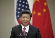 Chinese President Xi Jinping addresses a joint news conference with U.S. President Barack Obama in the Rose Garden at the White House in Washington, September 25, 2015. PHOTO BY REUTERS/Gary Cameron