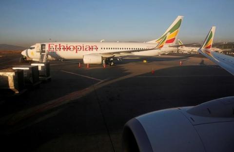 Workers service an Ethiopian Airlines plane at the Bole International Airport in Ethiopia's capital Addis Ababa, January 26, 2017. PHOTO BY REUTERS/Amr Abdallah Dalsh