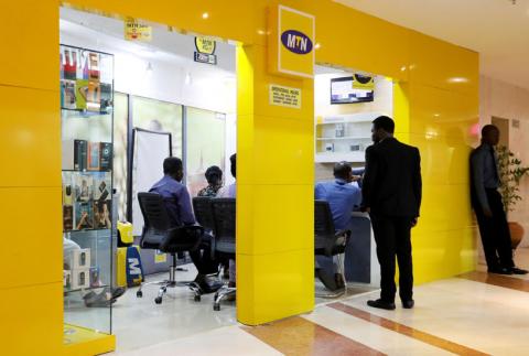 Customers are pictured inside an MTN dealer shop in Abuja, Nigeria, September 11, 2018. PHOTO BY REUTERS/Afolabi Sotunde