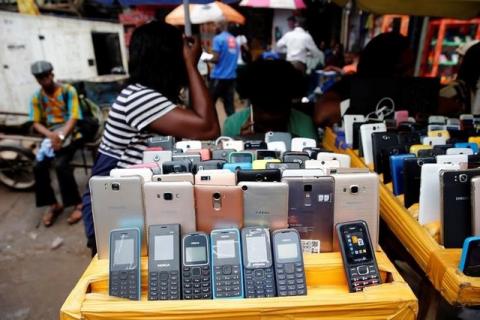 Nokia phone models are displayed for sale along with smartphones at the 'Computer Village' in Ikeja district, in Nigeria's commercial capital Lagos, Nigeria, May 31, 2017. PHOTO BY REUTERS/Akintunde Akinleye