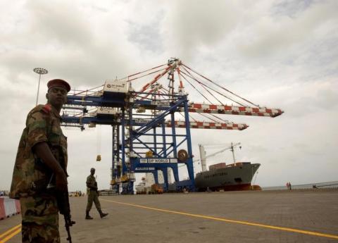 A Djibouti policeman stands guard during the opening ceremony of Dubai-based port operator DP World's Doraleh container terminal in Djibouti port, February 7, 2009. PHOTO BY REUTERS/Ahmed Jadallah
