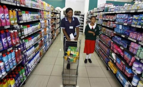Zimbabweans shop in a supermarket in the capital Harare. PHOTO BY REUTERS/Philimon Bulawayo