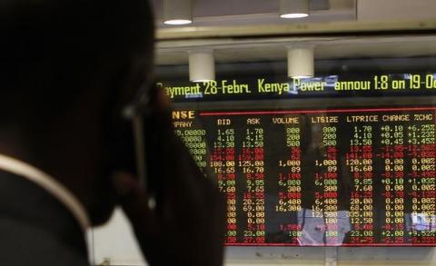 A stockbroker transacts shares during a trading session at the Nairobi Securities Exchange in Kenya's capital Nairobi, January 11, 2012. PHOTO BY REUTERS/Thomas Mukoya