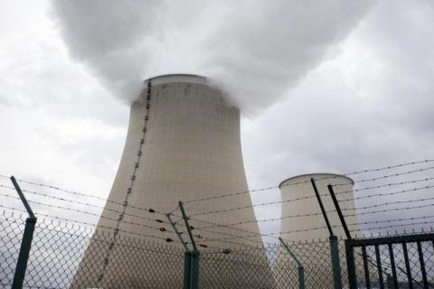 Steam rises from the cooling towers at a nuclear power station in a file photo. PHOTO BY REUTERS/Charles Platiau
