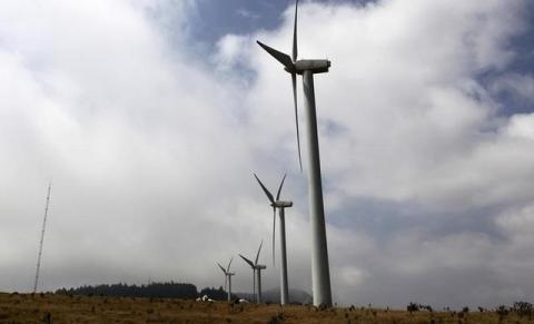 Power-generating wind turbines are seen at the Kenya Electricity Generating Company (KenGen) station in Ngong hills, about 22 km (14 miles) southwest of Kenya's capital Nairobi. PHOTO BY REUTERS/Thomas Mukoya