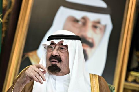 Saudi King Abdullah bin Abdul Aziz al-Saud sits before a meeting with U.S. Secretary of State John Kerry at the Royal Palace in Jeddah September 11, 2014 in this file photo. PHOTO BY REUTERS/Brendan Smialowski