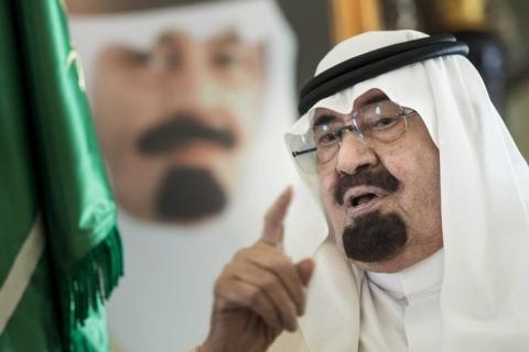 Saudi King Abdullah bin Abdulaziz al-Saud speaks before a meeting with U.S. Secretary of State John Kerry (not pictured) at his private residence in the Red Sea city of Jeddah, June 27, 2014. PHOTO BY REUTERS/Brendan Smialowski