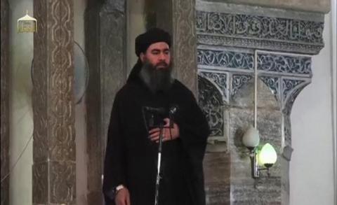 A man purported to be the reclusive leader of the militant Islamic State Abu Bakr al-Baghdadi has made what would be his first public appearance at a mosque in the centre of Iraq's second city, Mosul, according to a video recording posted on the Internet on July 5, 2014, in this still image taken from video. PHOTO BY REUTERS/Social Media Website