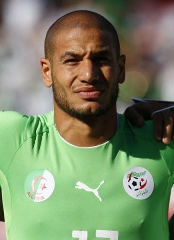 Algeria's Adlene Guedioura listens to the national anthem before their friendly soccer match against Armenia in Sion