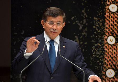 Turkish Prime Minister Ahmet Davutoglu addresses his AK Party local officials at the party headquarters in Ankara, Turkey, June 11, 2015. PHOTO BY REUTERS/Stringer