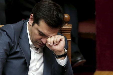 Greek Prime Minister Alexis Tsipras reacts during a parliamentary session in Athens, Greece, July 16, 2015. PHOTO BY REUTERS/Alkis Konstantinidis