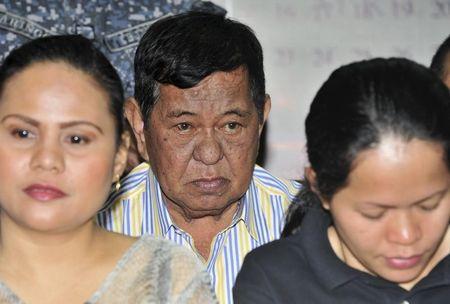 Former Maguindanao Governor Andal Ampatuan Sr. (C) attends the arraignment of his electoral sabotage case at a regional trial court in Pasay, east of Manila, March 26, 2012. REUTERS/Noel Celis