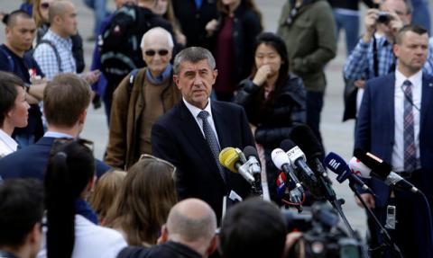 Czech Finance Minister Andrej Babis speaks to journalists, as he leaves Prague Castle, after meeting with President Milos Zeman in Prague, Czech Republic, May 3, 2017. PHOTO BY REUTERS/David W Cerny