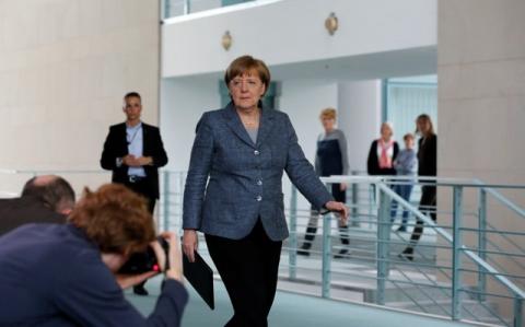 German Chancellor Angela Merkel arrives to give a statement on Turkey's request to seek prosecution of German comedian Jan Boehmermann who read out a sexually crude poem about Turkish President Tayyip Erdogan on German television, at the Chancellery in Berlin, Germany April 15, 2016. PHOTO BY REUTERS