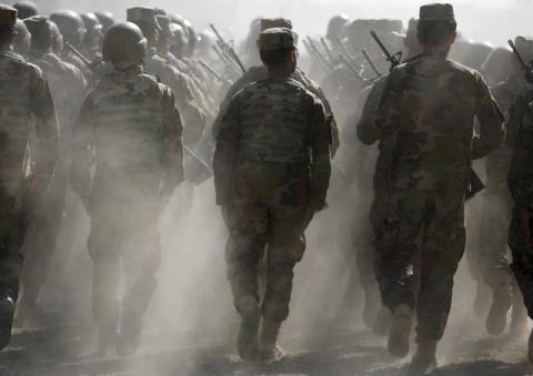 Afghan National Army (ANA) officers march during a training exercise at the Kabul Military Training Centre in Afghanistan, October 7, 2015. PHOTO BY REUTERS/Ahmad Masood