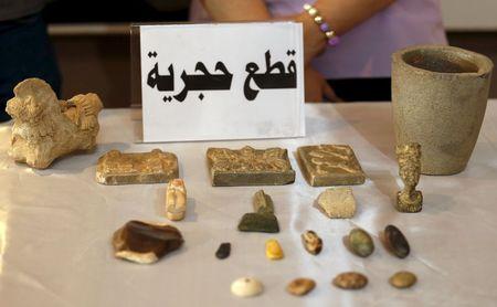 Recovered artifacts are seen at the National Museum of Iraq in Baghdad, July 15, 2015. PHOTO BY REUTERS/Thaier Al-Sudani