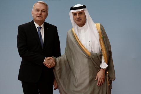 French Foreign Minister Jean-Marc Ayrault (L) shakes hands with Saudi Foreign Minister Adel al-Jubeir prior to an international and interministerial conference in a bid to revive the Israeli-Palestinian peace process, in Paris, France, June 3, 2016. PHOTO BY REUTERS/Stephane de Sakutin