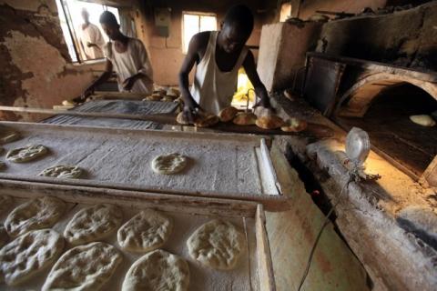 A baker prepares bread in a file photo, Khartoum, December 31, 2010. PHOTO BY REUTERS/Mohamed Nureldin Abdallah