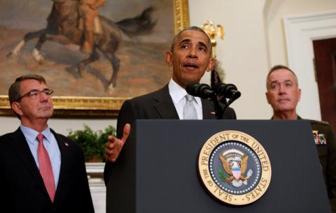 U.S. President Barack Obama, surrounded by U.S. Secretary of Defense Ash Carter (L) and the Chairman of the Joint Chiefs of Staff USMC General Joseph Dunford, Jr., (R) delivers a statement from the Roosevelt Room on Afghanistan at the White House in Washington U.S., July 6, 2016. PHOTO BY REUTERS/Gary Cameron