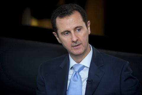 Syria's President Bashar al-Assad is seen during an interview in Damascus with the magazine, Literarni Noviny newspaper, January 8, 2015. PHOTO BY REUTERS/SANA