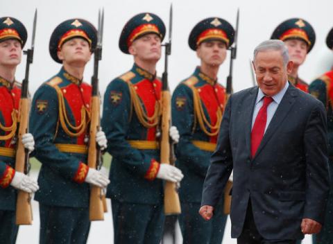Israeli Prime Minister Benjamin Netanyahu inspects the honour guard during a welcoming ceremony upon his arrival at Moscow's Vnukovo airport, Russia, June 6, 2016. PHOTO BY REUTERS/Sergei Karpukhin