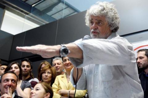 Leader of the anti-establishment 5-Star Movement Beppe Grillo gestures during a news conference in Rome, April 21, 2013. PHOTO BY REUTERS/Remo Casilli