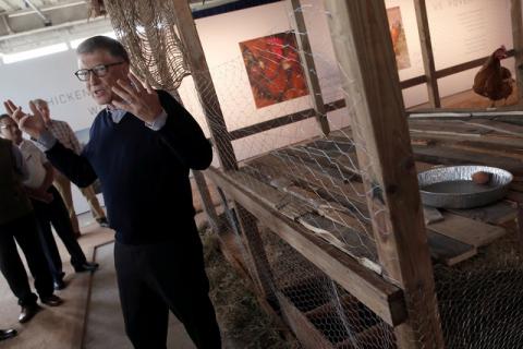 Billionaire philanthropist and Microsoft's co-founder Bill Gates speaks to the media, in front of a chicken coop set up on the 68th floor of the 4 World Trade Center tower, in Manhattan, New York, U.S., June 8, 2016. PHOTO BY REUTERS/Mike Segar