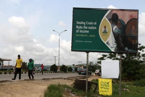 A billboard campaigning against crude oil theft is seen alongside a road in Yenagoa, the capital of Nigeria's oil state of Bayelsa. PHOTO BY REUTERS/Akintunde Akinleye