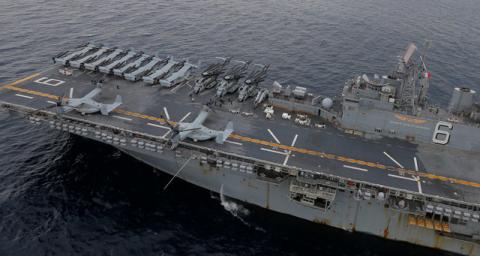 U.S. Marines MV-22 Osprey Aircraft sit on the deck of the USS Bonhomme Richard amphibious assault ship off the coast of Sydney, Australia, June 29, 2017. PHOTO BY REUTERS/Jason Reed