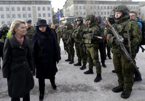 German Defence Minister Ursula von der Leyen (L) and Lithuania's President Dalia Grybauskaite attend a ceremony to welcome the German battalion being deployed to Lithuania as part of NATO deterrence measures against Russia in Rukla, Lithuania, February 7, 2017. PHOTO BY REUTERS/Ints Kalnins