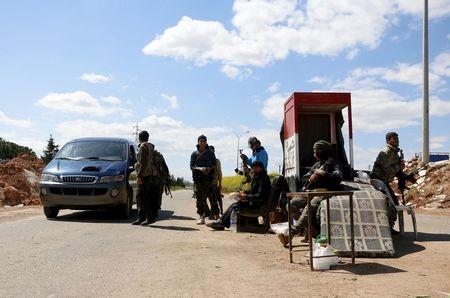 Members of al Qaeda's Nusra Front man a checkpoint at the entrance of Idlib city, April 14, 2015. PHOTO BY REUTERS/Mohamad Bayoush