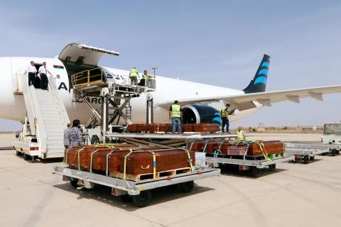 Coffins containing the remains of the bodies of Egyptian Copts killed by Islamic State militants in Sirte are carried by the plane to be transferred to Egypt, in Misrata, Libya, May 14, 2018. PHOTO BY REUTERS/Ismail Zitouny