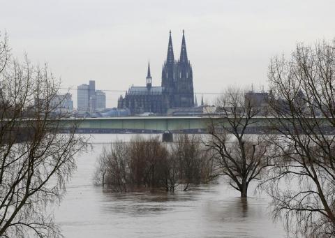 Cologne cathedral is seen with the flooded river Rhine in Cologne, January 9, 2011. PHOTO BY REUTERS/Ina Fassbender