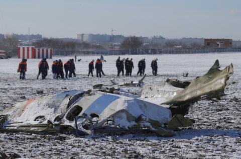 Emergencies Ministry members work at the crash site of a Boeing 737-800 Flight FZ981 operated by Dubai-based budget carrier Flydubai, at the airport of Rostov-On-Don, Russia, March 20, 2016. PHOTO BY REUTERS/Maxim Shemetov