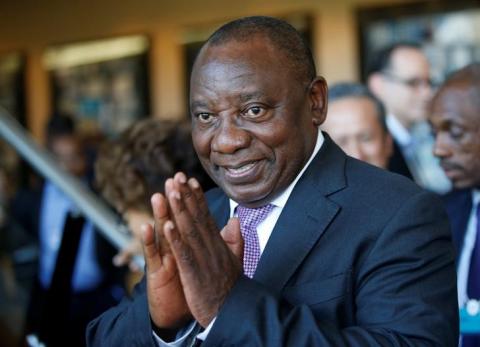 South African Deputy President Cyril Ramaphosa greets security personal at the World Economic Forum on Africa 2017 meeting in Durban, South Africa, May 5, 2017. PHOTO BY REUTERS/Rogan Ward
