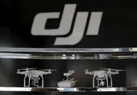 Drones are displayed inside DJI's first flagship store of DJI in Shenzhen, China December 18, 2015, two days before it's official opening. PHOTO BY REUTERS/Bobby Yip