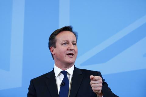 Britain's Prime Minister David Cameron speaks on the economy to an audience at a school in Poole, southern England, December 15, 2014. PHOTO BY REUTERS/Andrew Winning