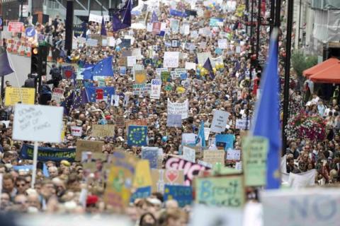 People hold banners during a demonstration against Britain's decision to leave the European Union, in central London, Britain, July 2, 2016. PHOTO BY REUTERS/Paul Hackett